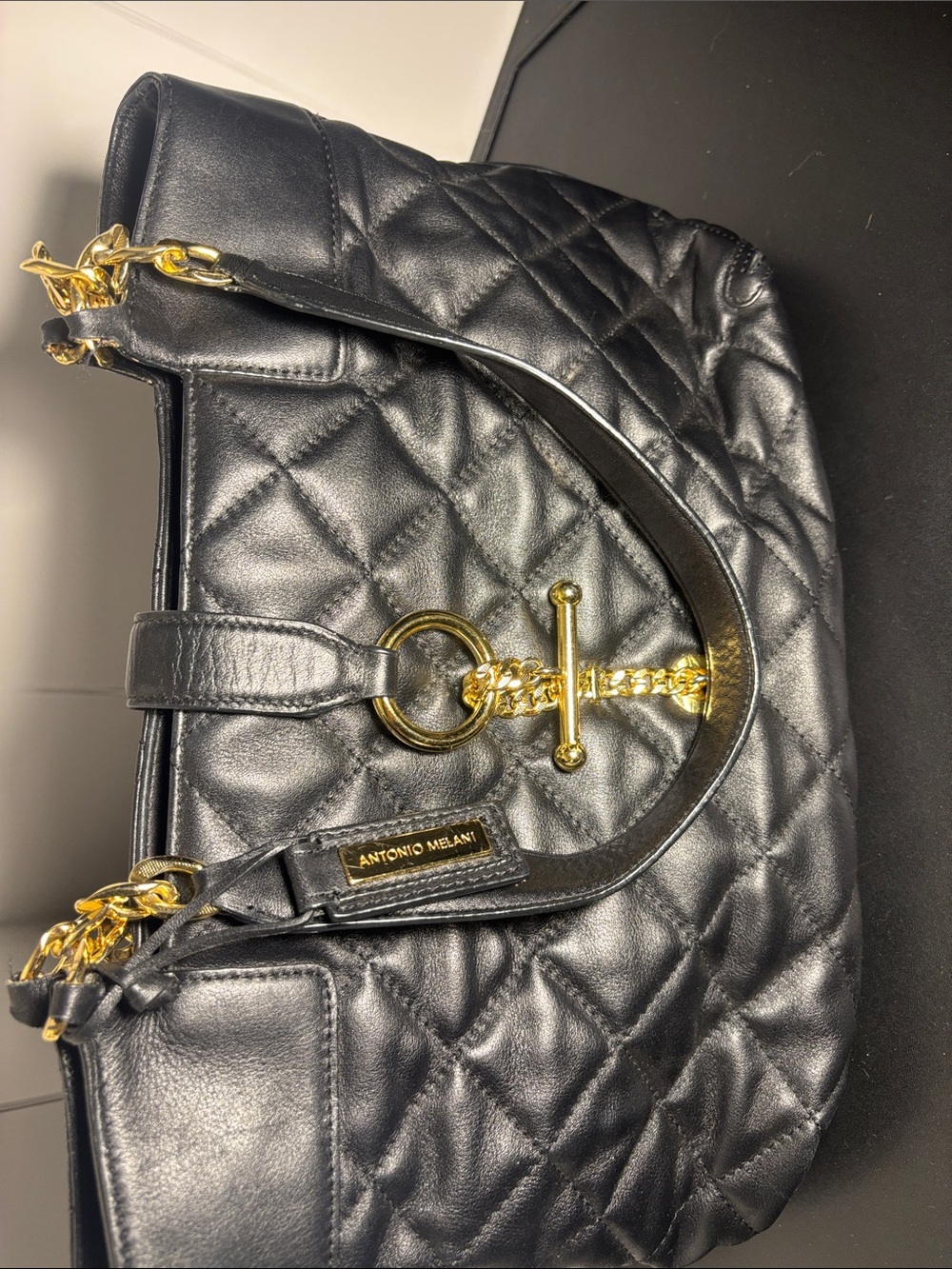 ANTONIO MELANI Black Quilted Shoulder Bag with Gold Chain Detail